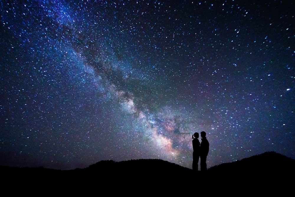 Couple against the stars