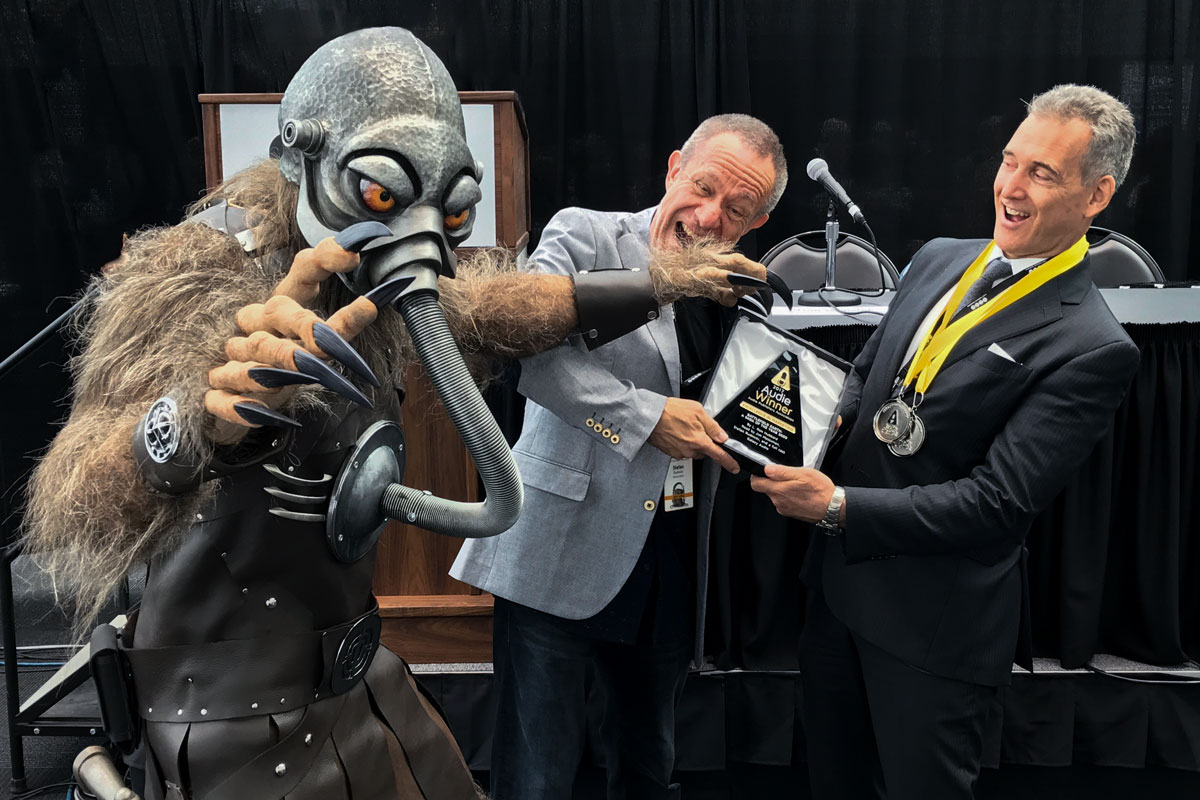 Terl grabbing the Audie Award for Battlefield Earth