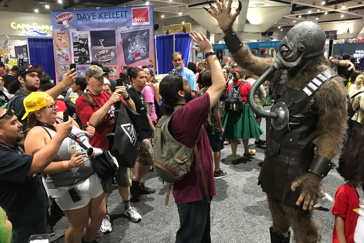 Fans taking pictures of Terl at SDCC.